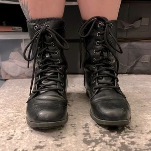 Size 7. Black combat boots. Safe step slip resistant.